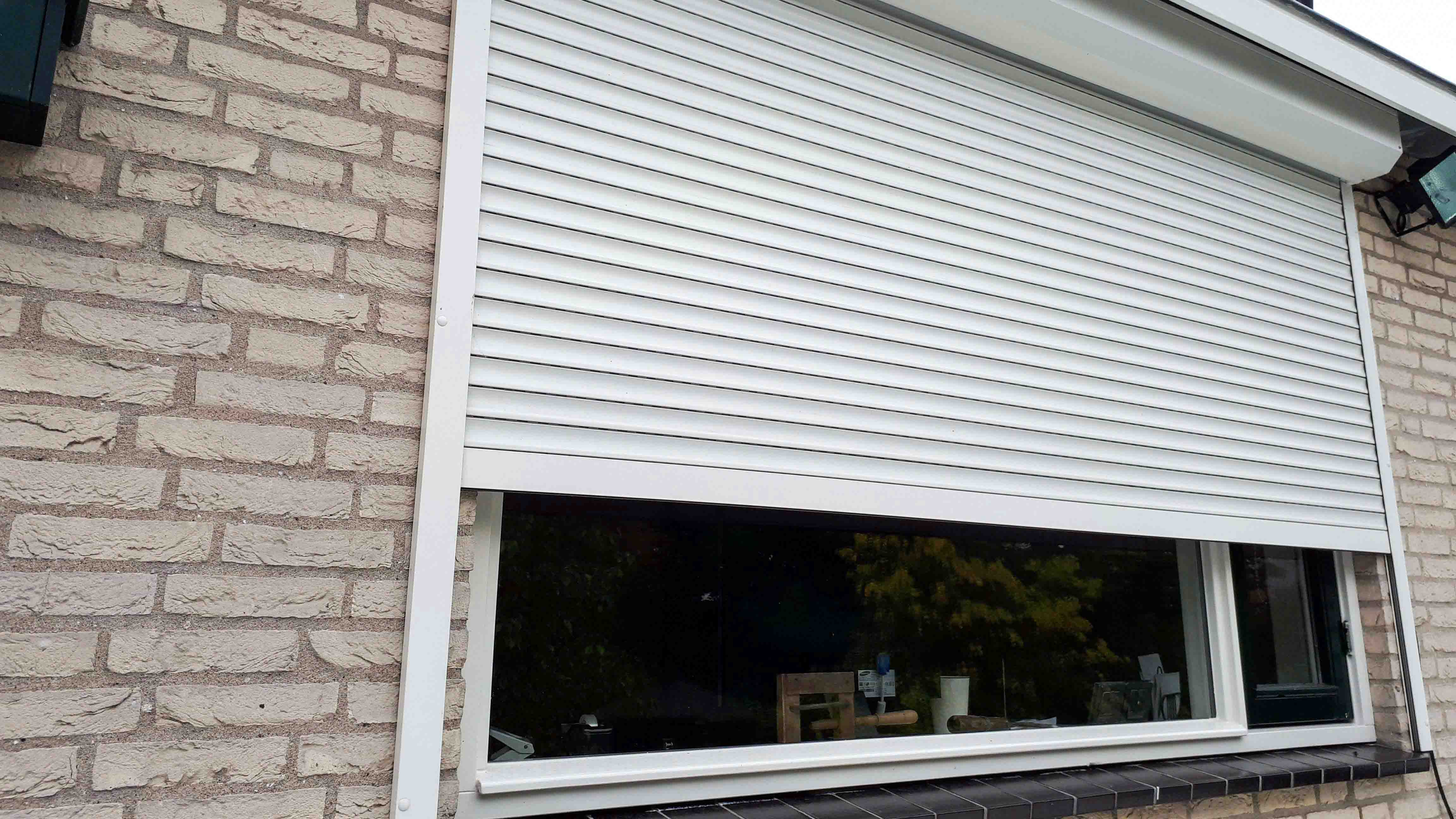 Rolluiken en zonwering - Timmerbedrijf Hak